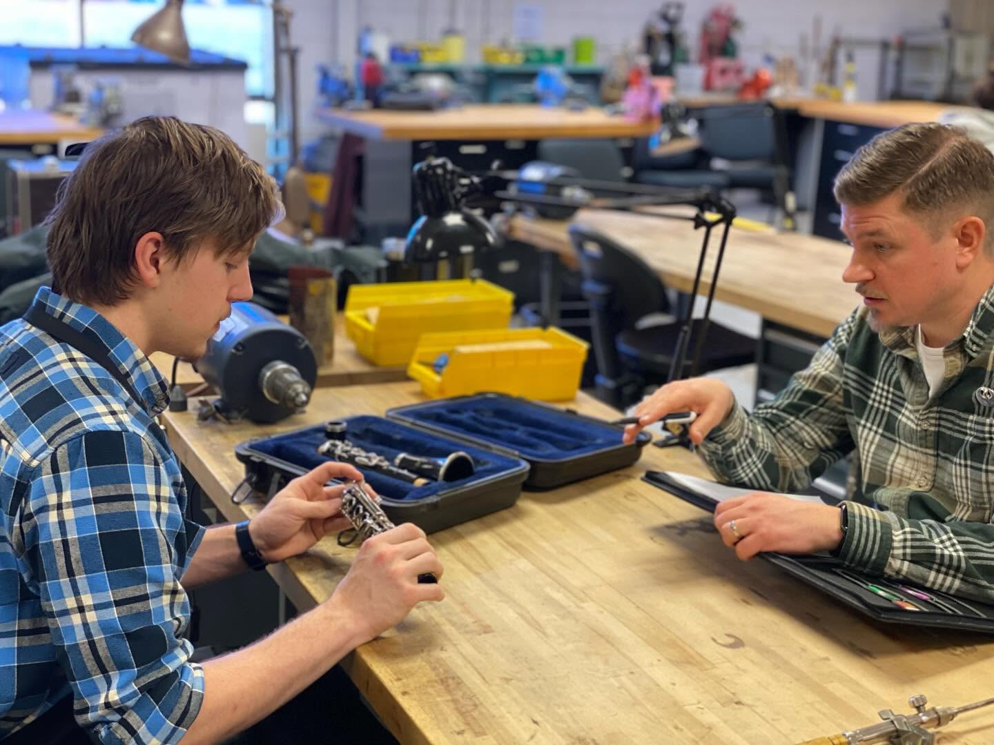 Harrison discussing instrument repair.